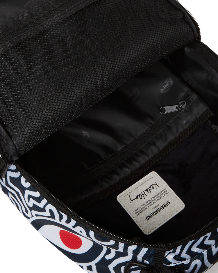 KEITH HARRING SKATER GUY PRINT DLXSV BACKPACK